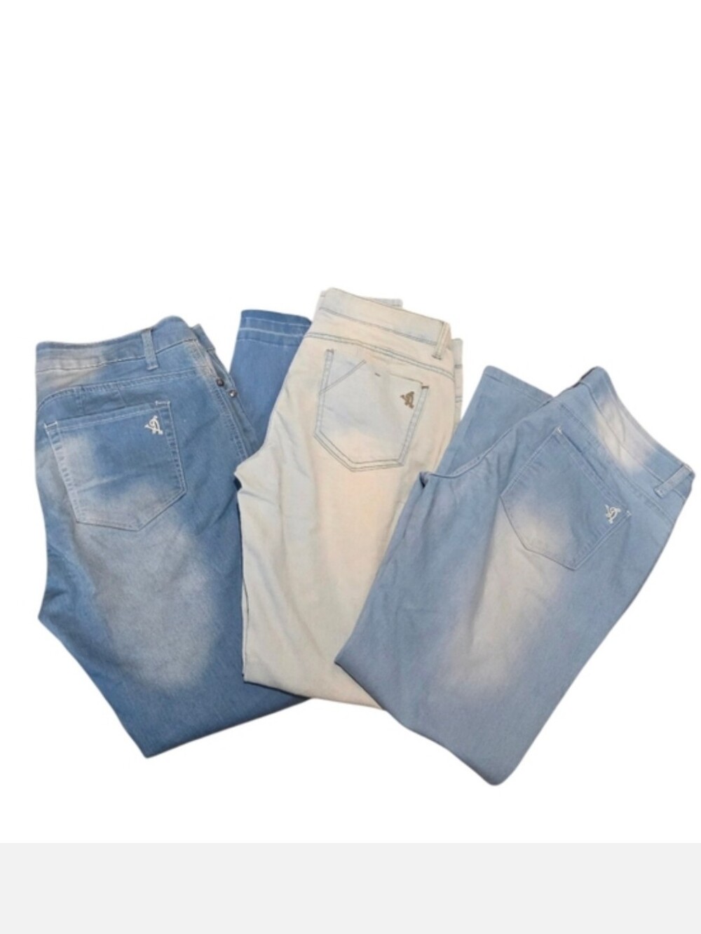 3 pairs of jeans (sky-blue) and one lighter-colored pair; all four are stretchy.
